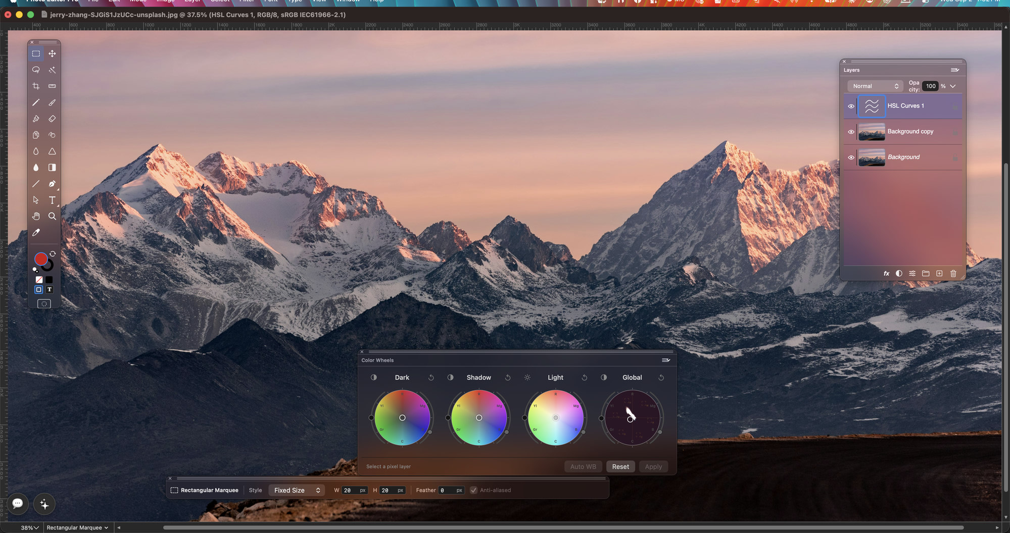 Photo Editor Pro with a mountain photograph open: HSL Curves adjustment layer, Color Wheels palette and the Layers palette